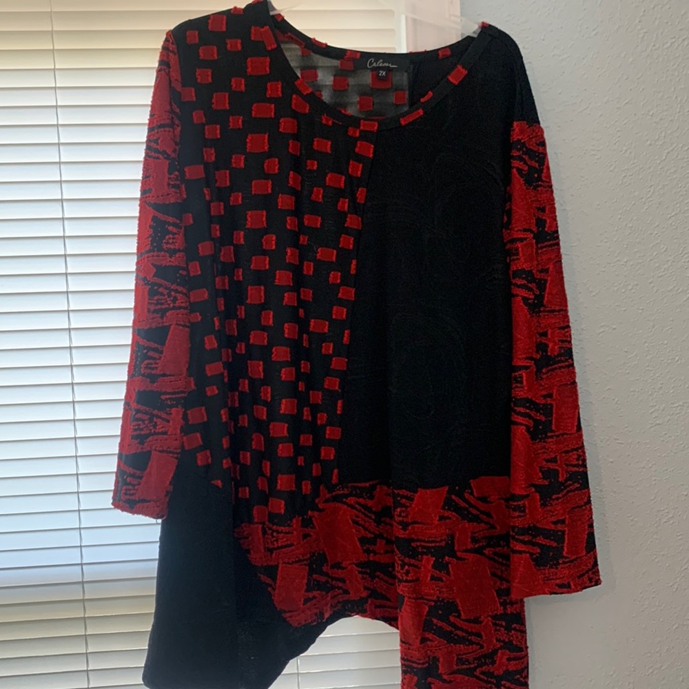 Red and black tunic.
